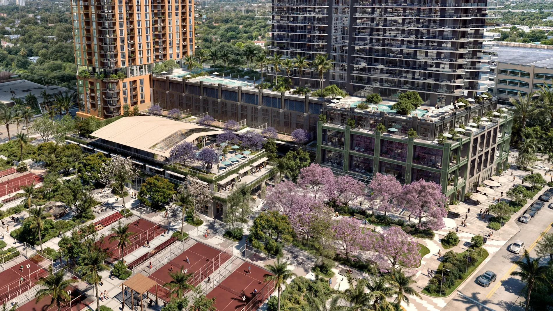 Aerial view of a luxury South Florida development with rooftop pools, padel courts, and palm trees showcasing resort-style living.